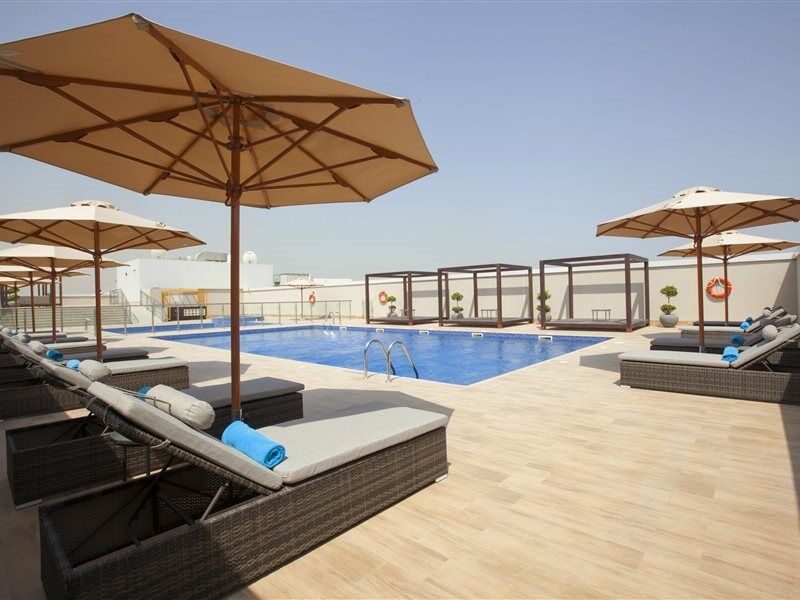 Flora Inn Hotel Dubai Airport Exterior photo Rooftop pool